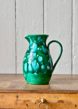 Load image into Gallery viewer, A hand thrown and green glazed jug