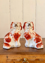 Load image into Gallery viewer, A pair of red and white antique hand painted King Charles Spaniel Staffordshire mantle dogs