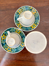 Load image into Gallery viewer, A French set of two cups and saucers and matching milk jug