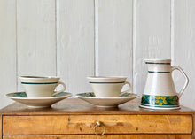 Load image into Gallery viewer, A French set of two cups and saucers and matching milk jug