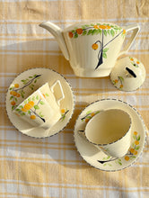 Load image into Gallery viewer, Tea pot and pair of cups and saucers by Crown Ducal