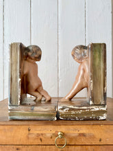 Load image into Gallery viewer, A rare pair of antique bronzed plaster bookends