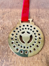 Load image into Gallery viewer, Punched shield brass decoration

