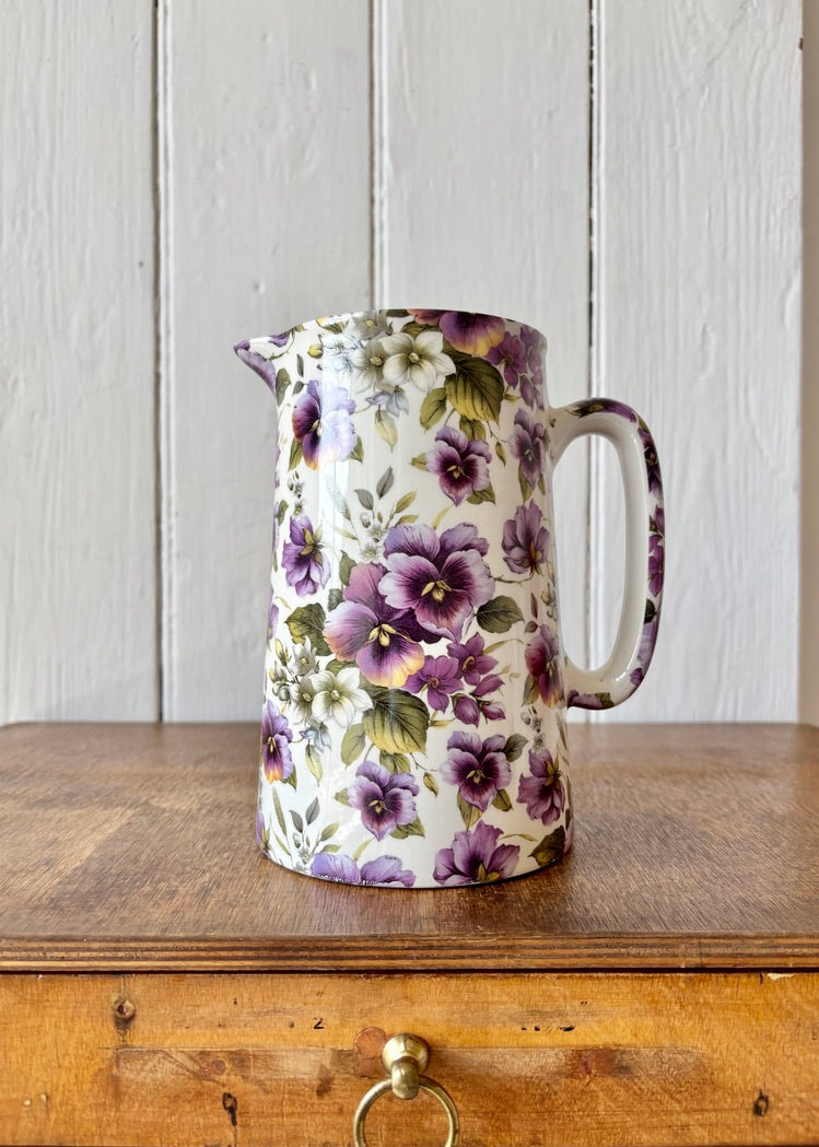 Floral jug with purple pansies