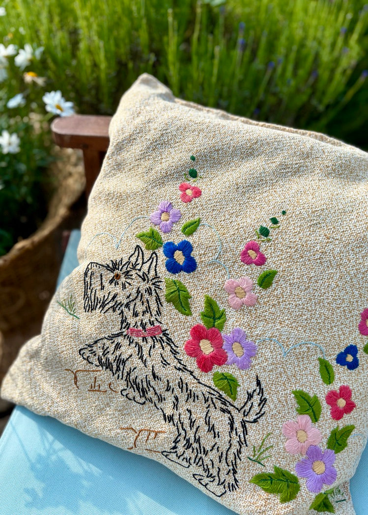 Hand embroidered French cushion with dog and Hollyhocks