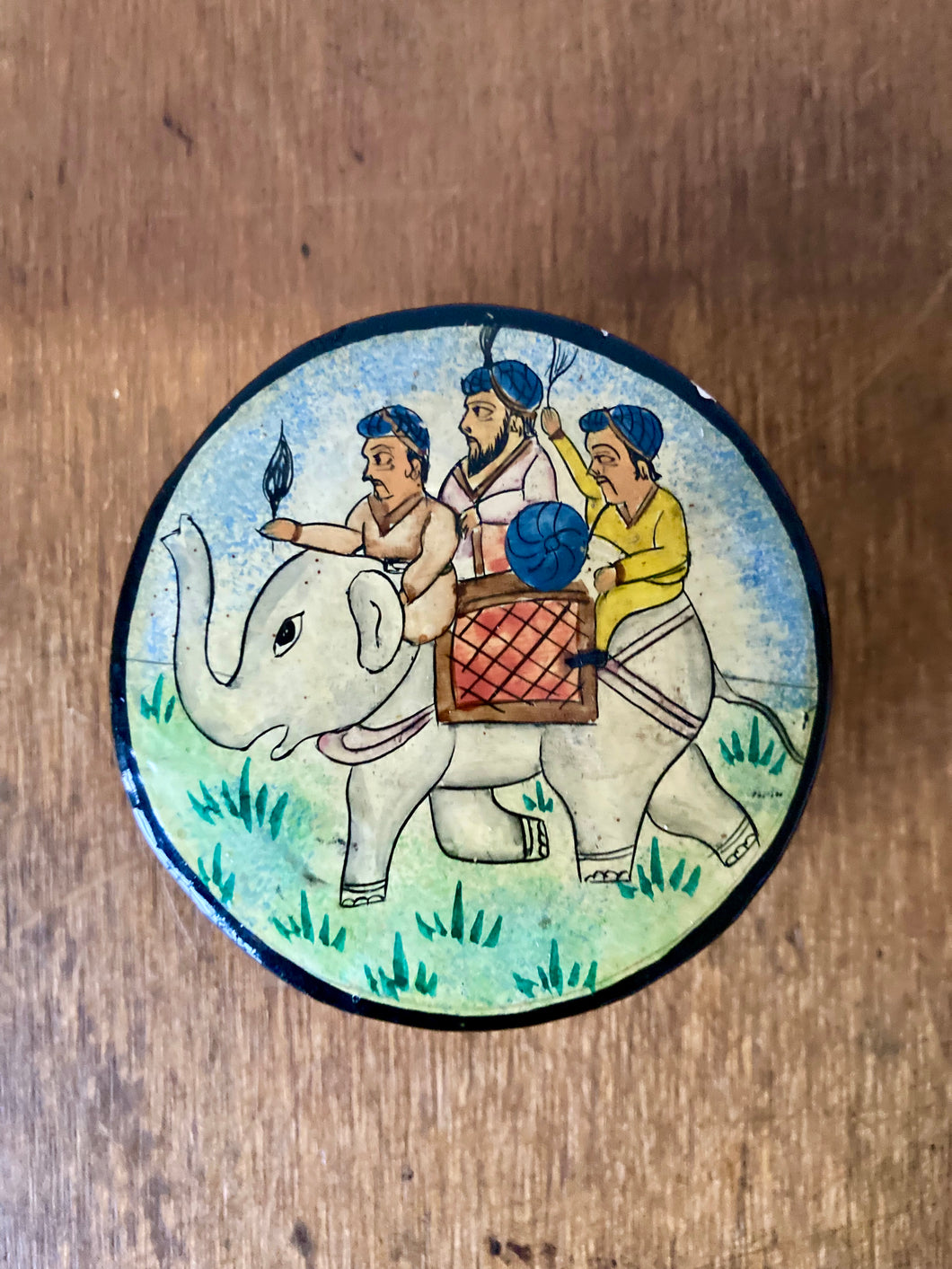 Round paper mâché lidded pot hand decorated with an elephant