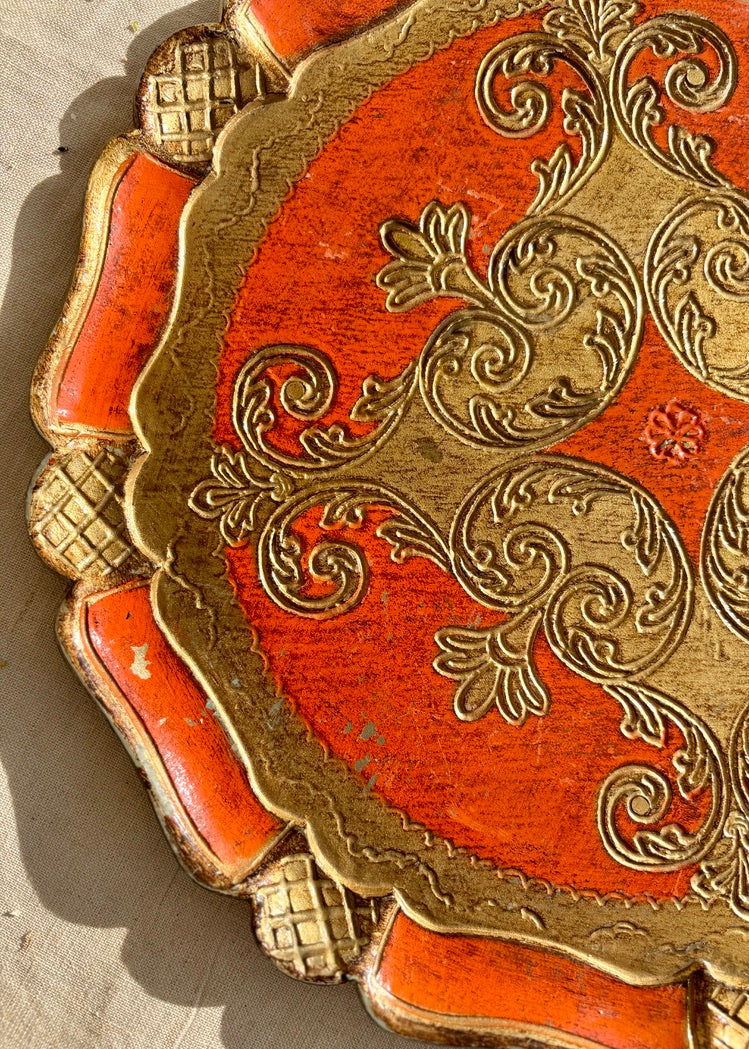 Orange and gilt papier mache Florentine circular tray