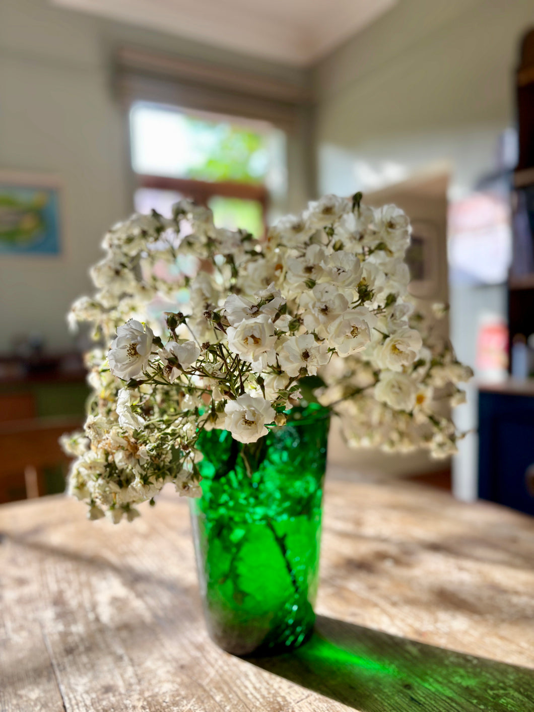 Large green, hand blown glass vase