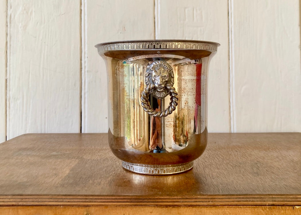 Silver metal wine cooler with lion handles