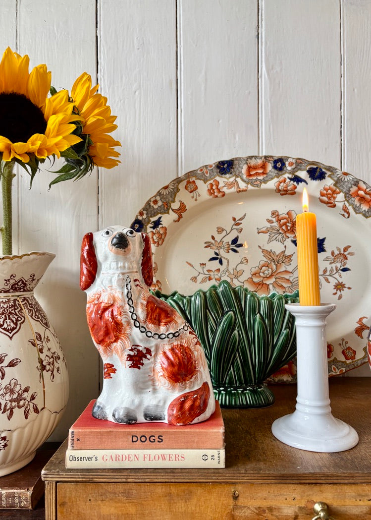 A pair of white china candlesticks by Doulton