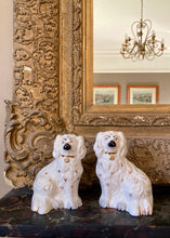 Load image into Gallery viewer, A pair of small white Royal Doulton Beswick King Charles Spaniel mantle dogs
