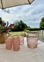 Load image into Gallery viewer, A pretty pink and gilt trimmed glass jug and six matching glasses
