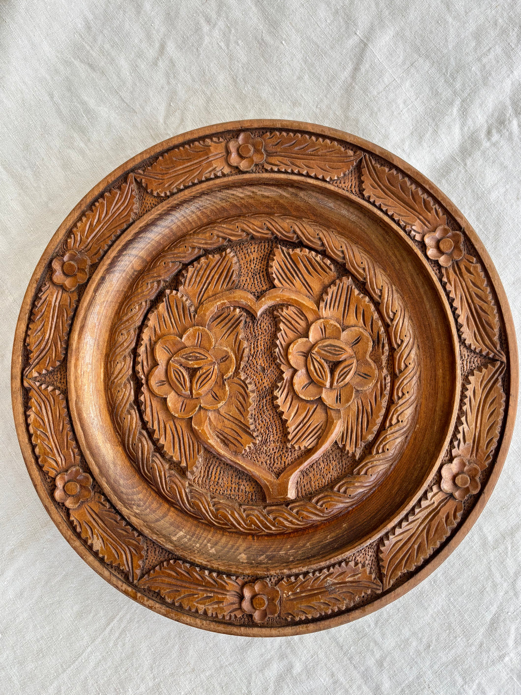 Hand turned and carved wooden decorative plate