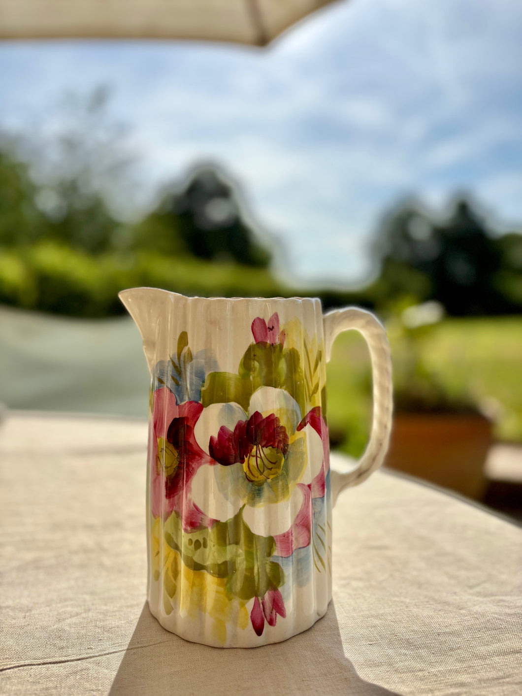 Antique fluted design hand painted floral jug