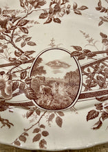 Load image into Gallery viewer, Bucolic English scene on this pretty brown on creamy white platter
