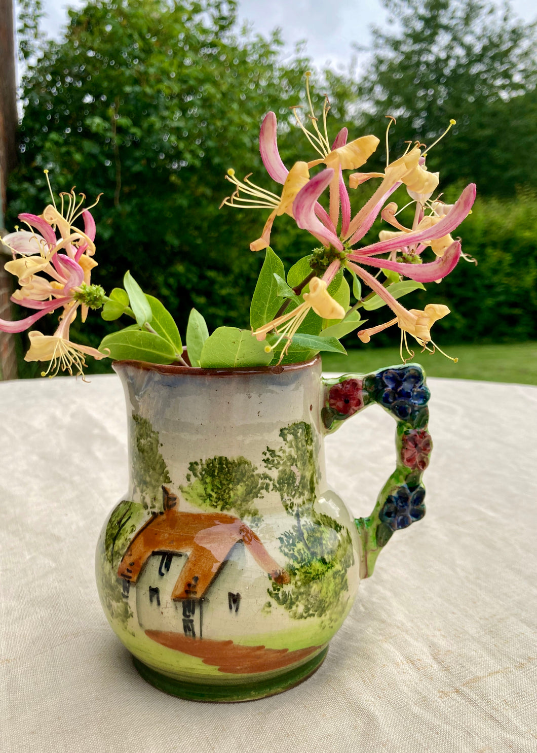 Earthernware, hand painted cottage garden jug