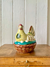 Load image into Gallery viewer, A decorative hand painted chicken egg tidy, sitting on her nest
