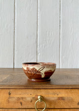 Load image into Gallery viewer, Studio pottery brown bowl with leaf decoration and slip glaze
