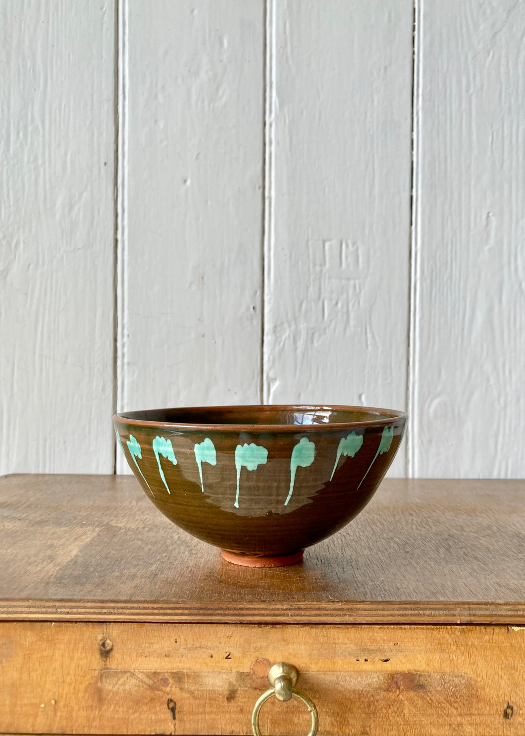 Studio pottery green glazed bowl with green ‘drop’ effect hand decoration