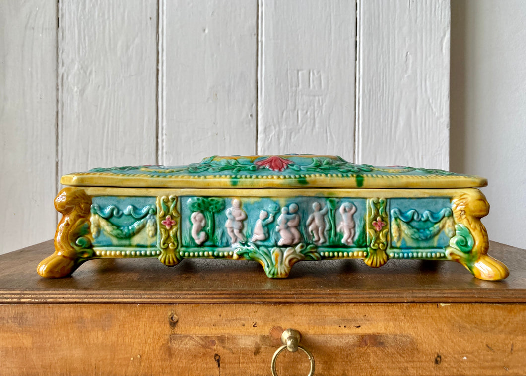 Large decorative ceramic lidded box on lion's feet