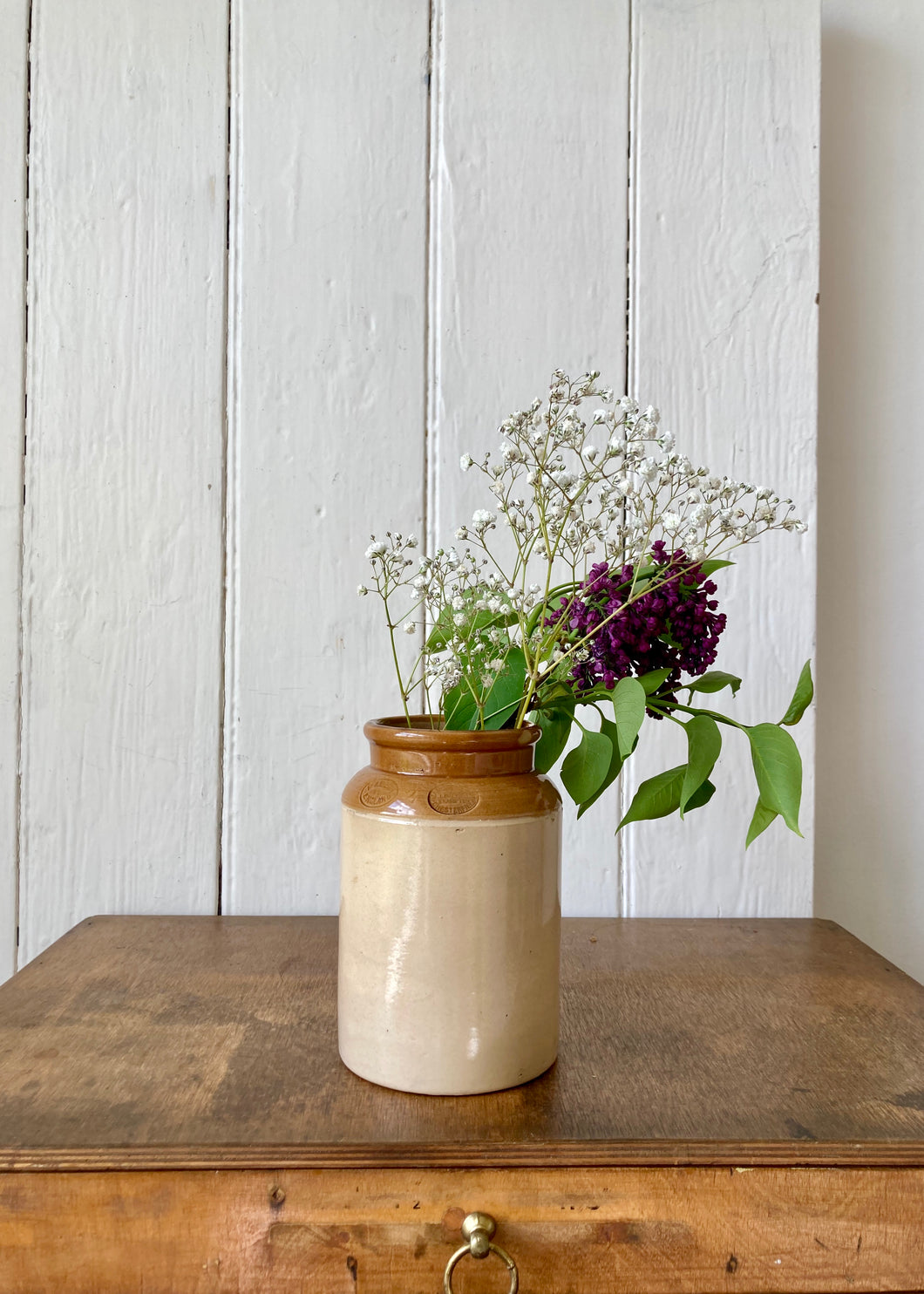 A rustic stoneware jar