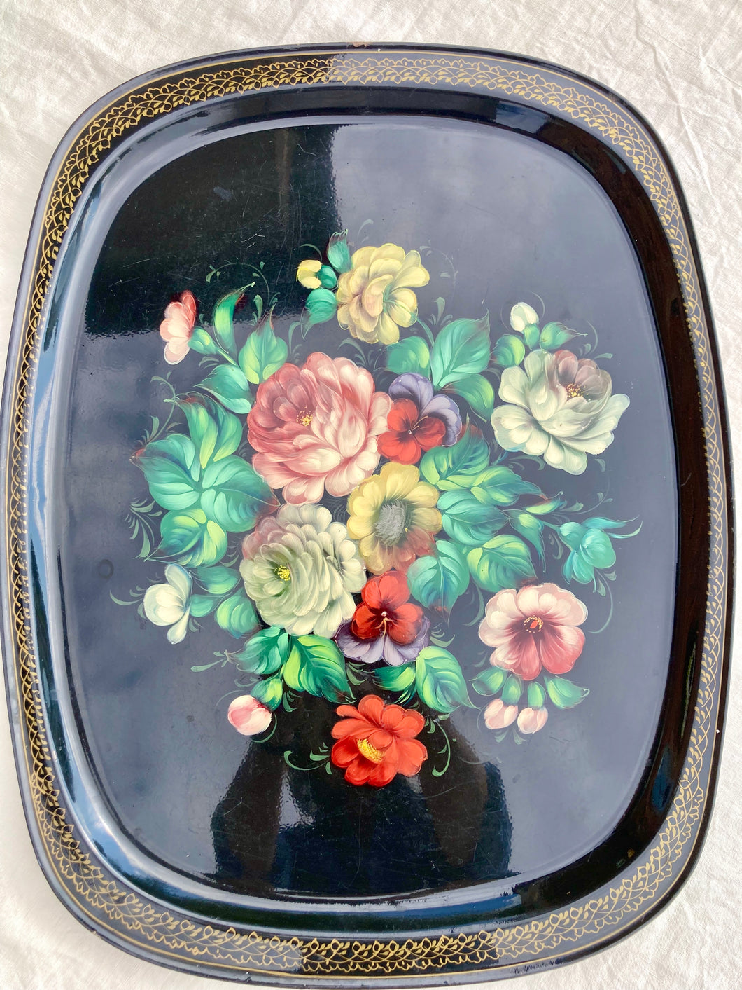 Large, black, rectangular toleware tray with hand painted floral decoration