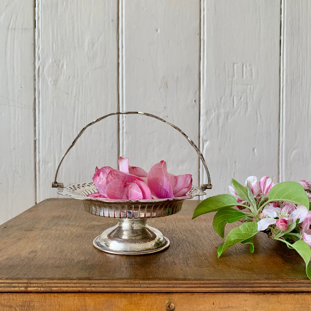 Silver plate footed bon-bon basket with handle