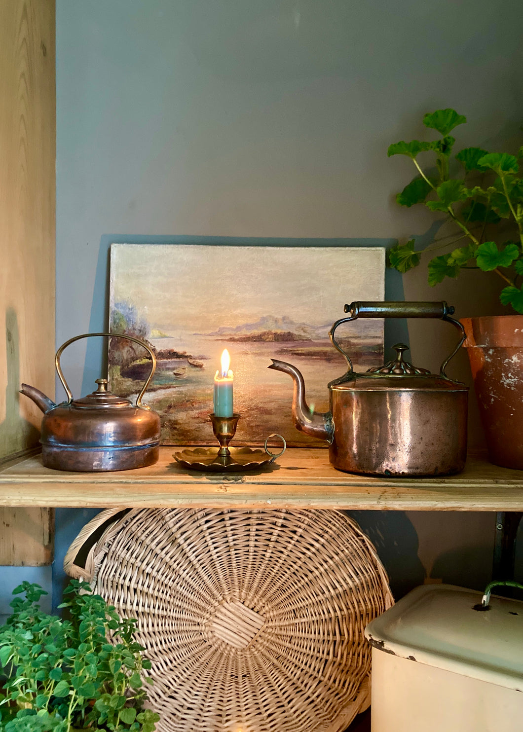 Small copper kettle with brass handle