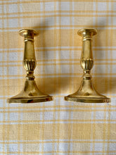 Load image into Gallery viewer, Pair of brass candlesticks with oval base
